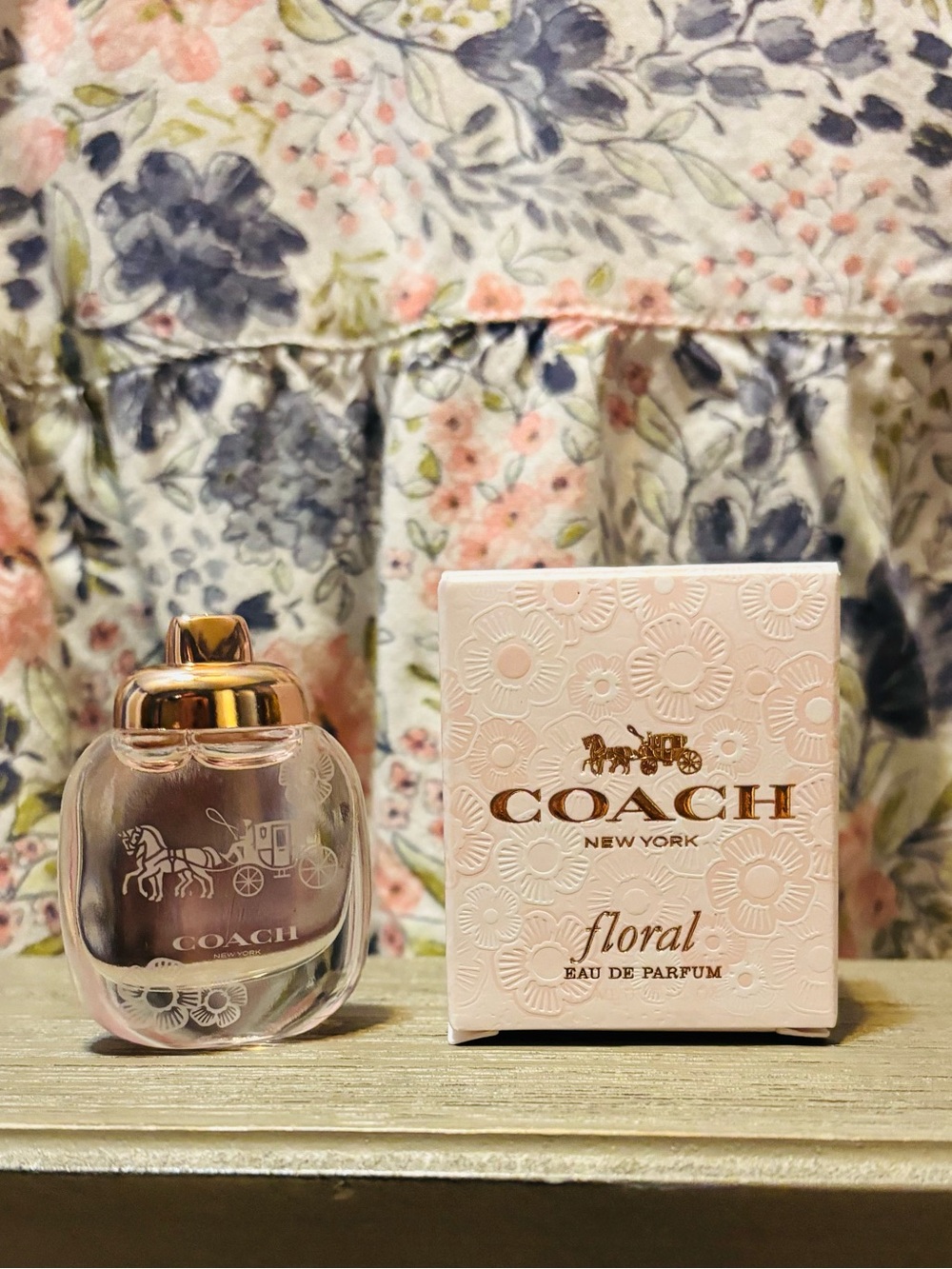 Coach New York floral dabber 4.5